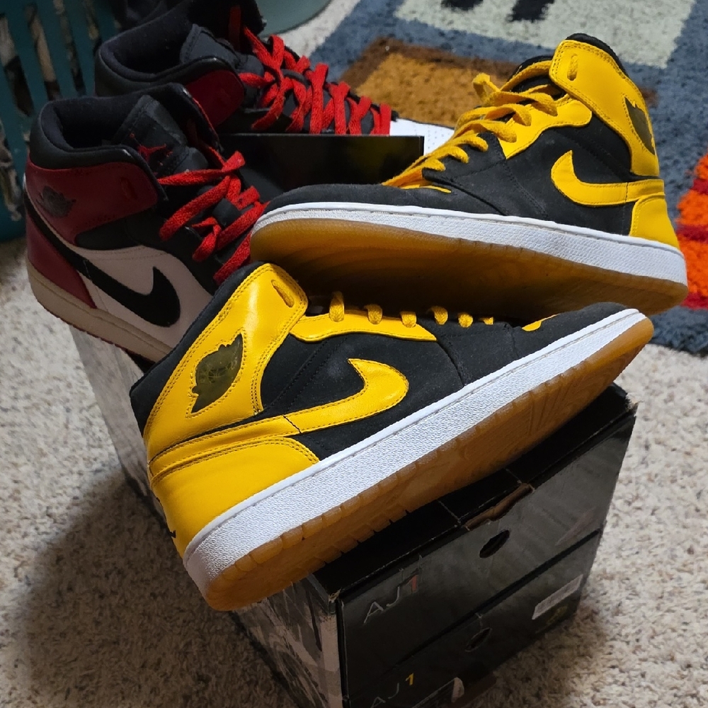 Jordan AJ1 Black and Yellow Sneakers